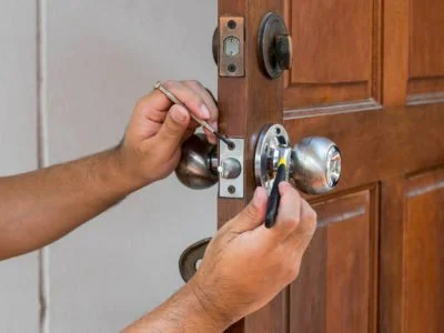 wood door and locksmith maintain silver knob