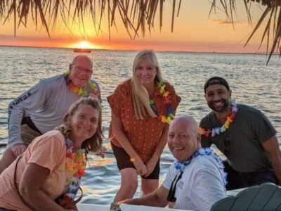 tiki patrons enjoying sunset